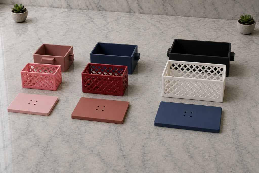 Small, Medium, and Large Loofah Pods open on marble with mixed case, basket, and lid colors.