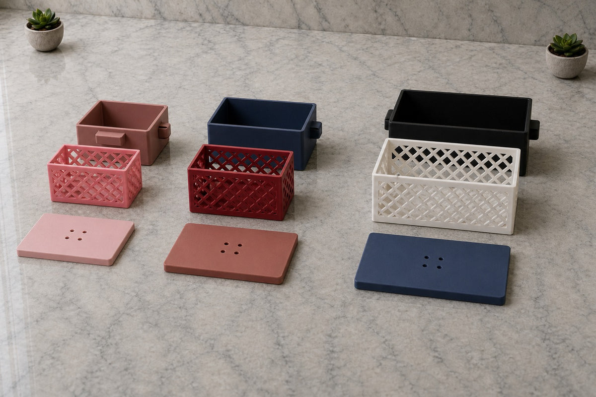 Small, Medium, and Large Loofah Pods open on marble with mixed case, basket, and lid colors.