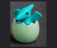 Teal winged dinosaur — generated design concept, not a printed sample