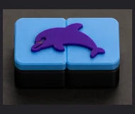 Dolphin clicker — generated design concept, not a printed sample